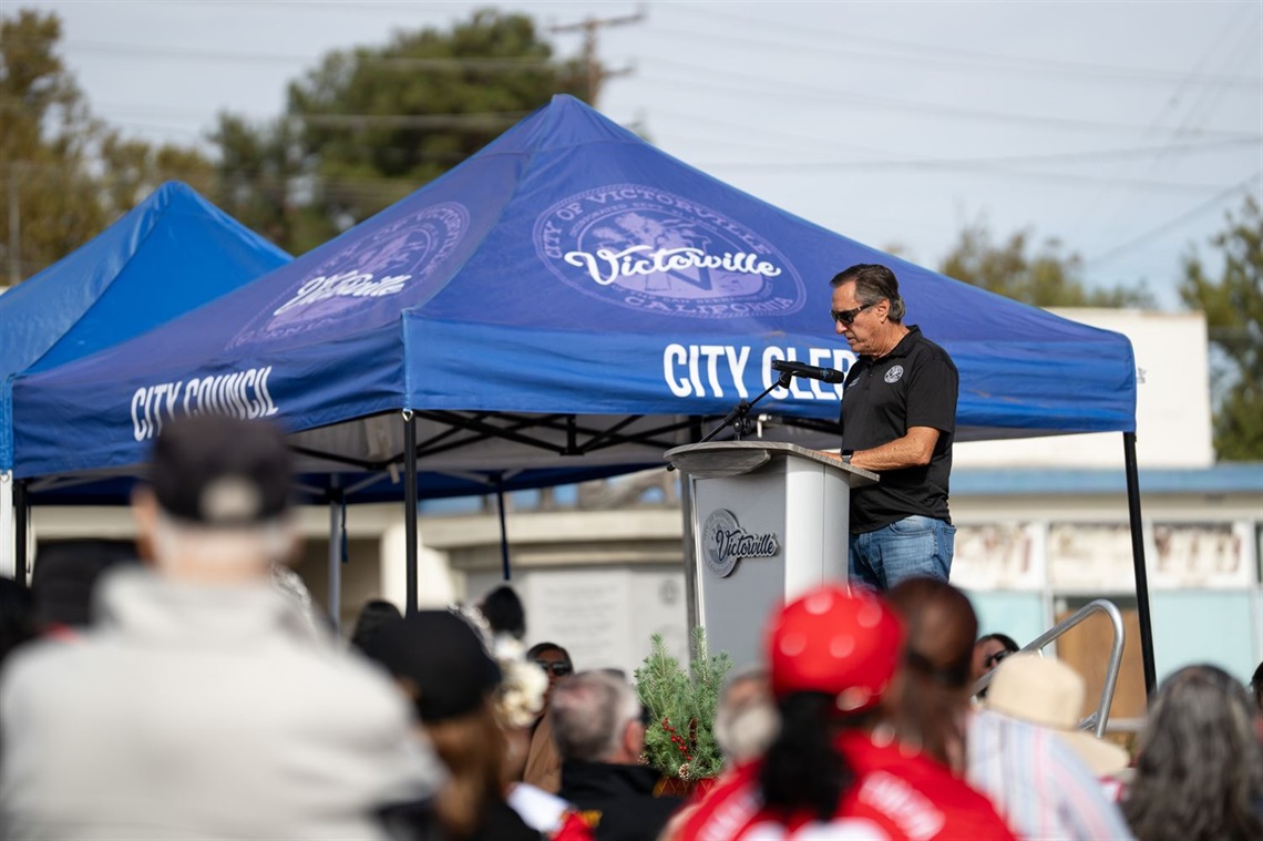 Mayor Pro Tem Harriman on stage at the Veterans Day Parade