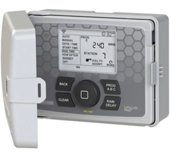 a smart irrigation controller with the panel opened showing the buttons